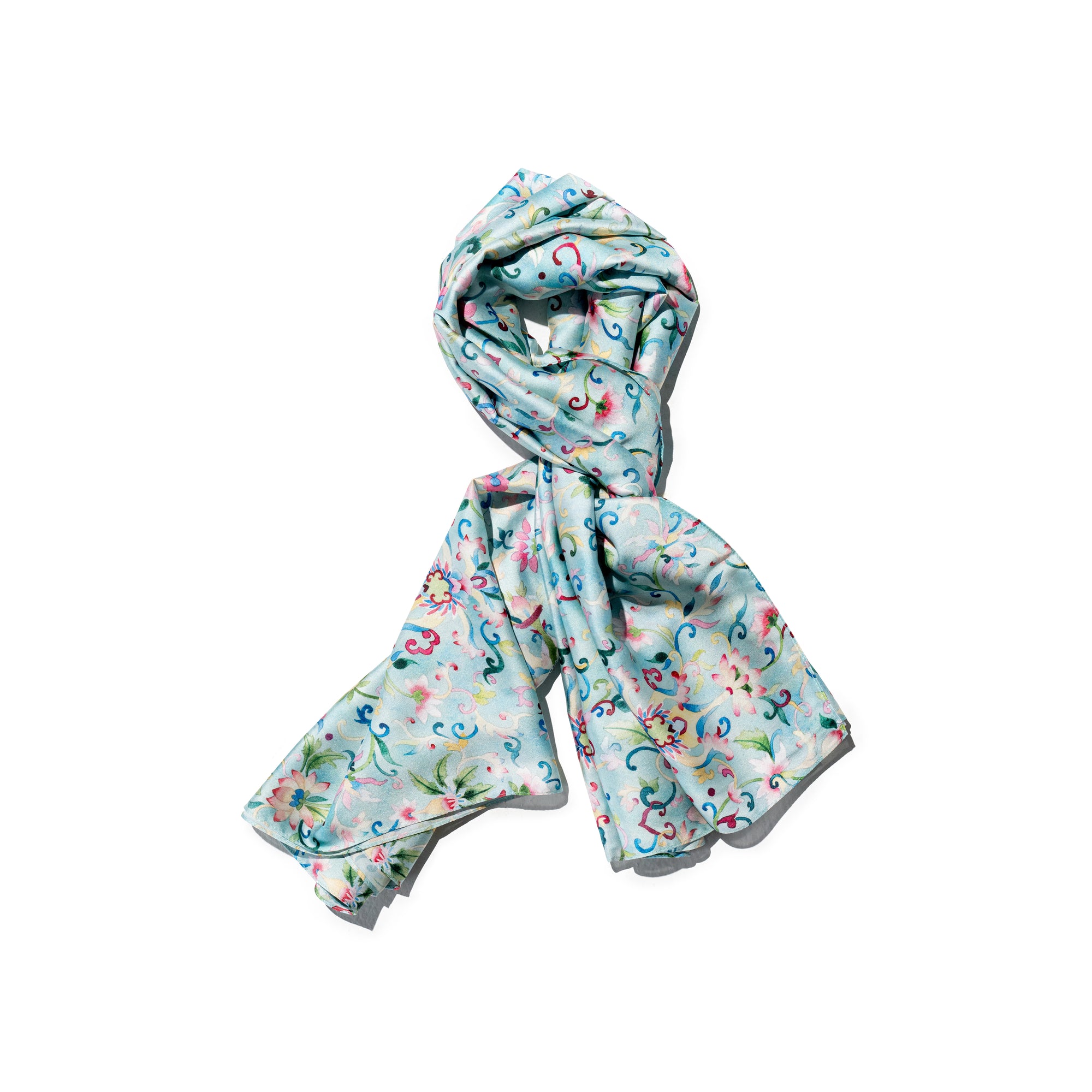 Singlapa blue scarf with colourful floral patterns.
