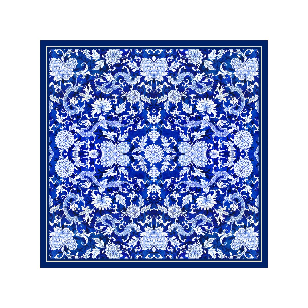 Singlapa blue and white pocket square with a floral and dragon pattern.