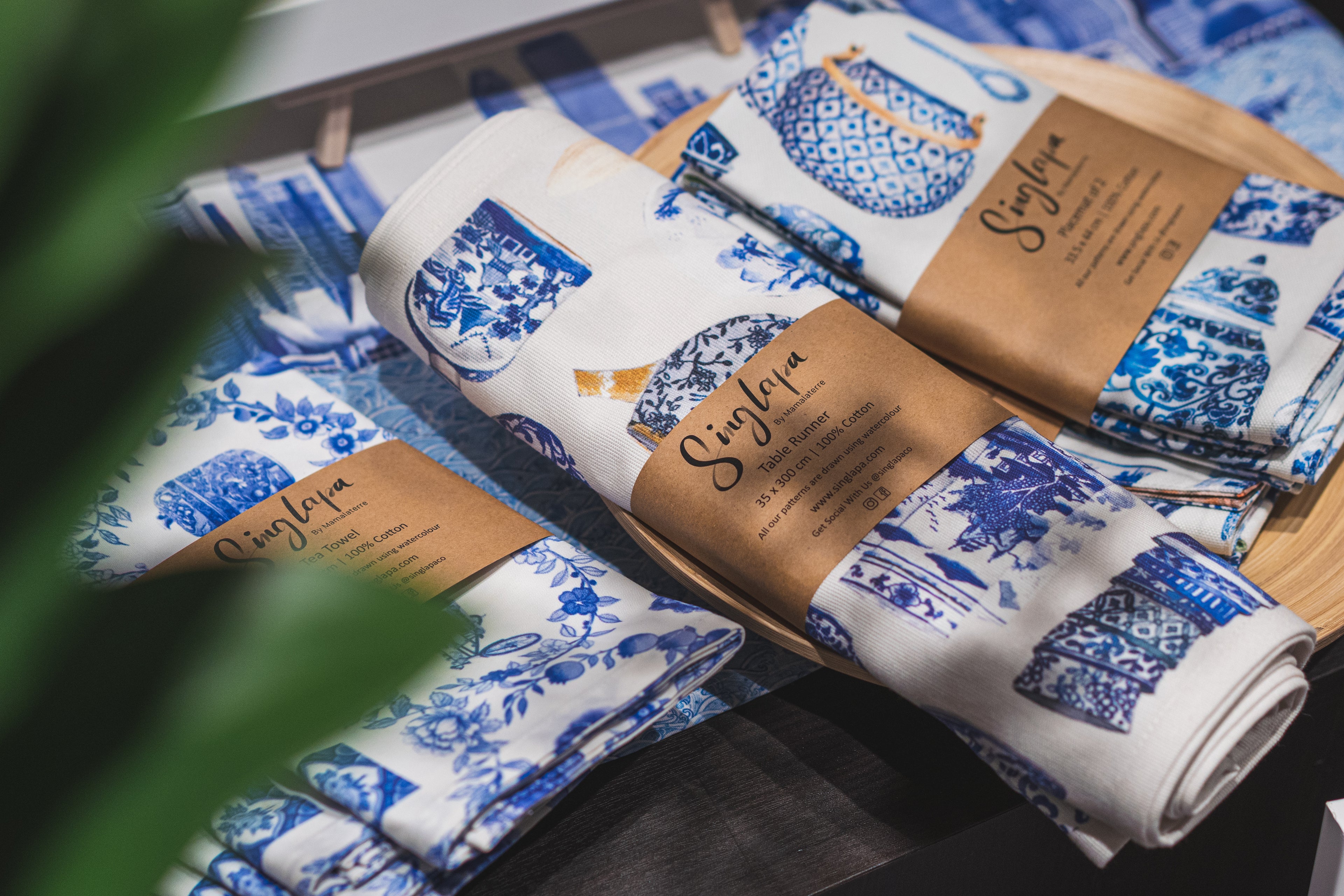 Singlapa table runners folded and wrapped with recyclable packaging