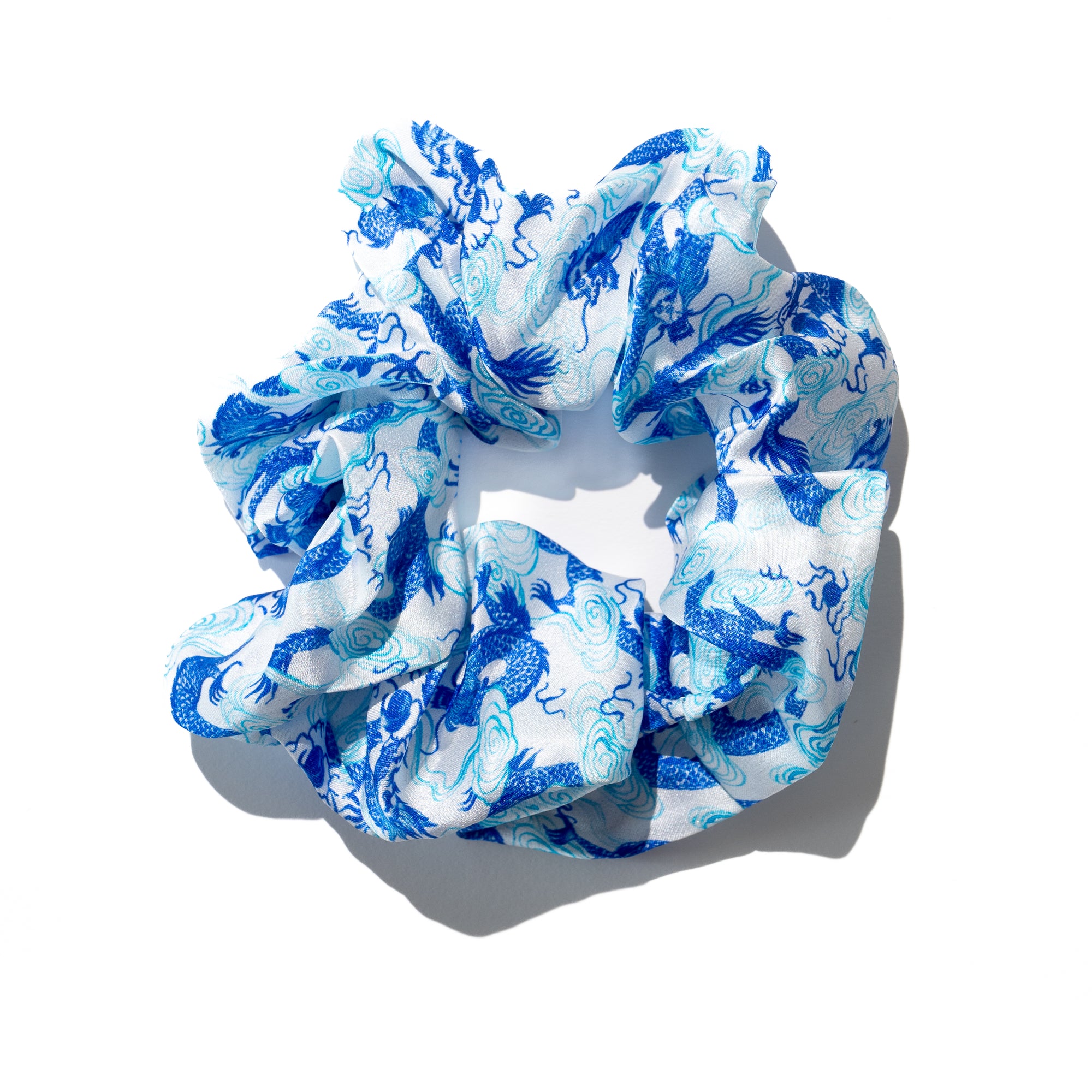Singlapa white silk scrunchie with blue dragons and clouds design