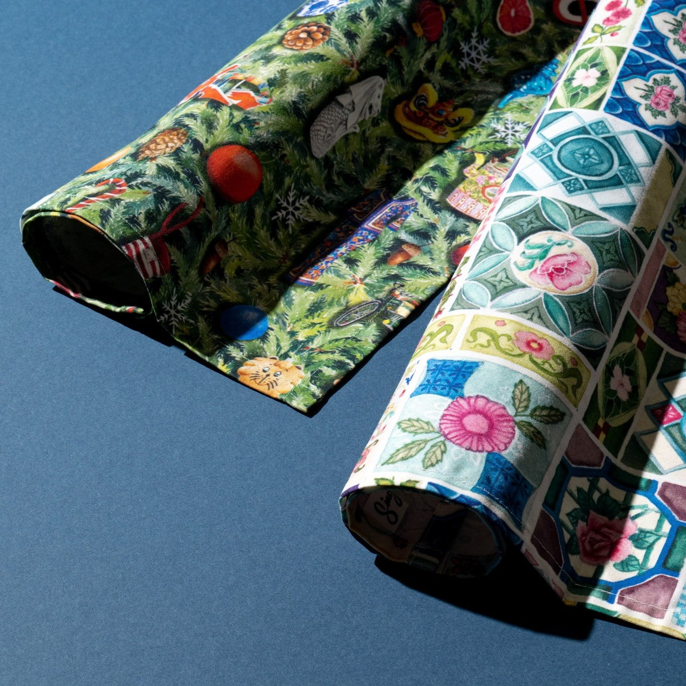 Artistic Napkins rolled on a blue background