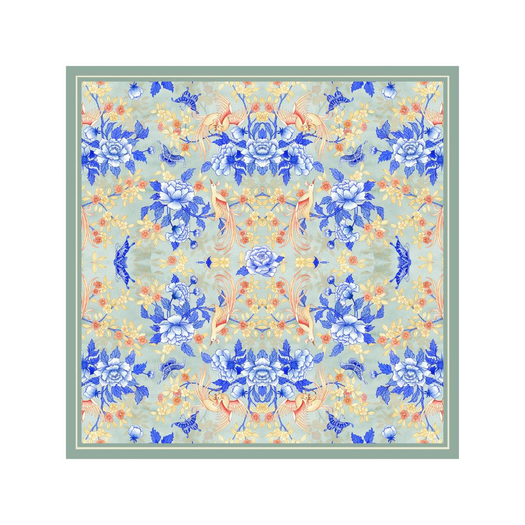 Singlapa grey pocket square with a floral pattern featuring birds and butterflies in shades of blue, orange, and beige.