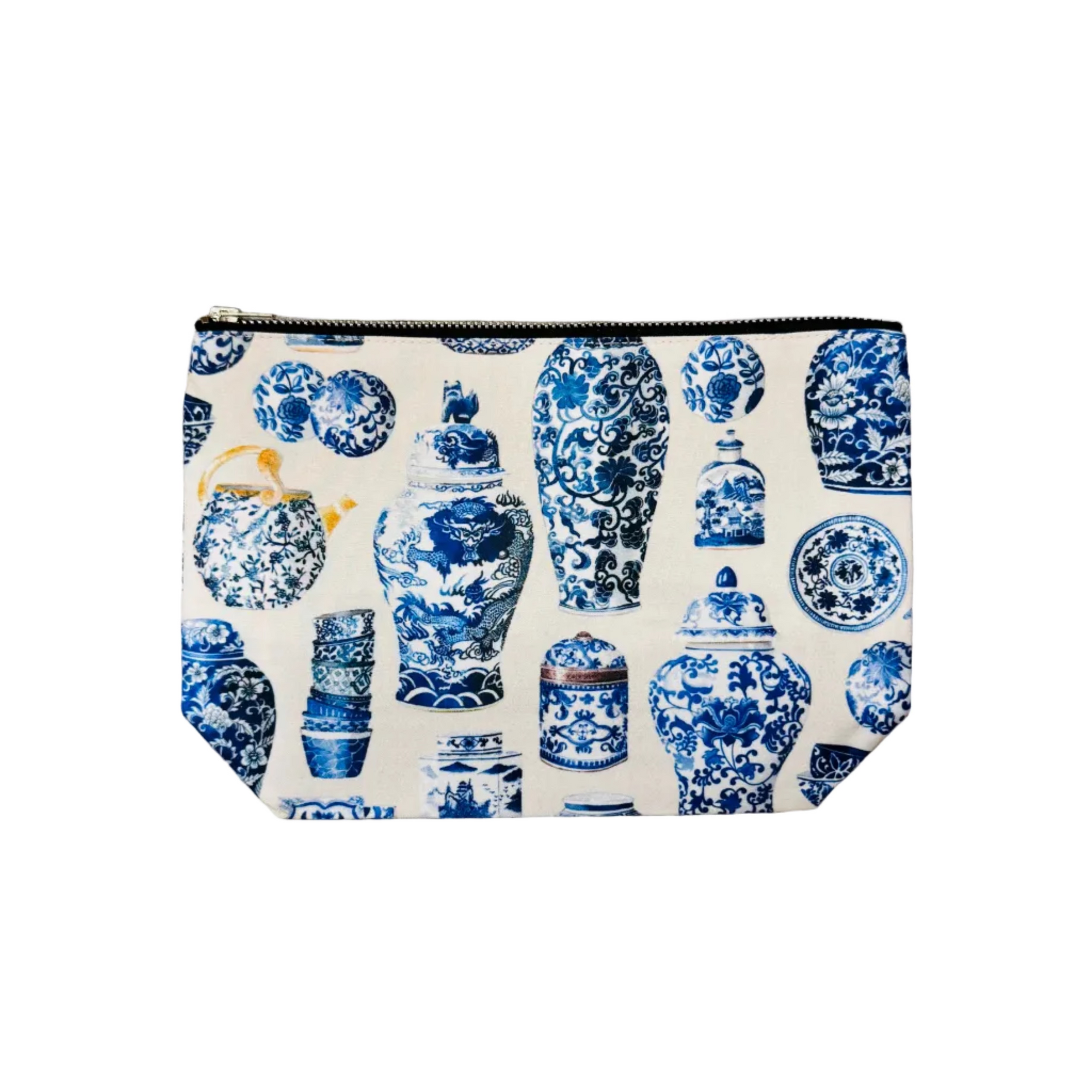 Pouch with blue and white ceramic pattern on a beige surface