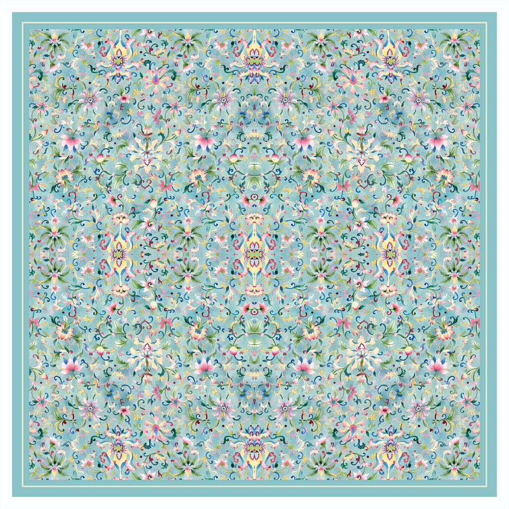 Singlapa Floral patterned silk scarf on a light blue background