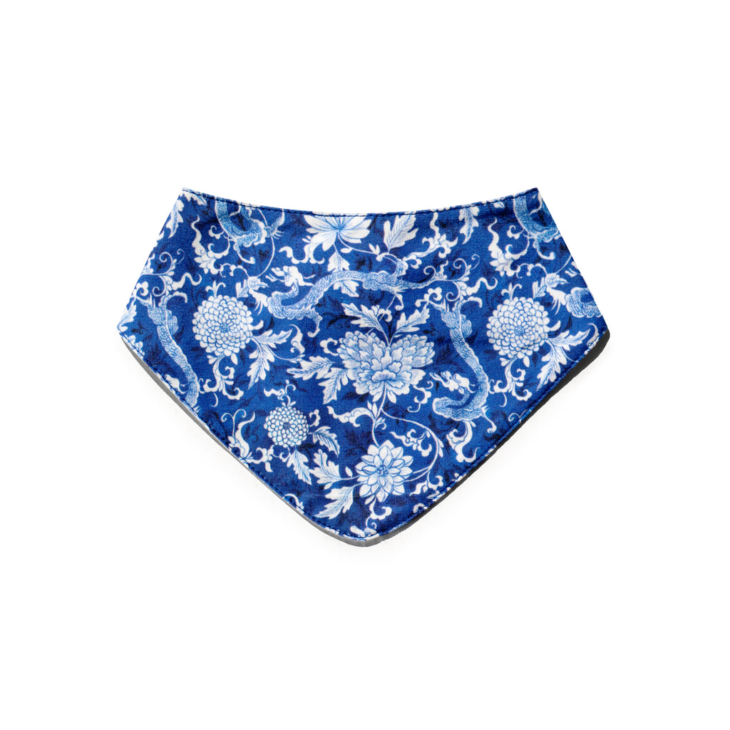 Singlapa blue baby bib with white dragon and floral print
