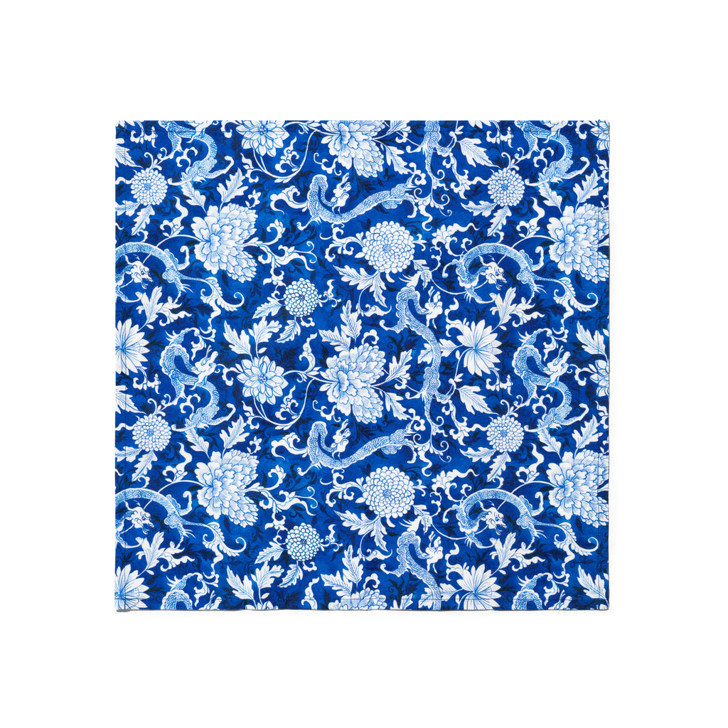 Singlapa blue napkin with a white floral and dragon pattern