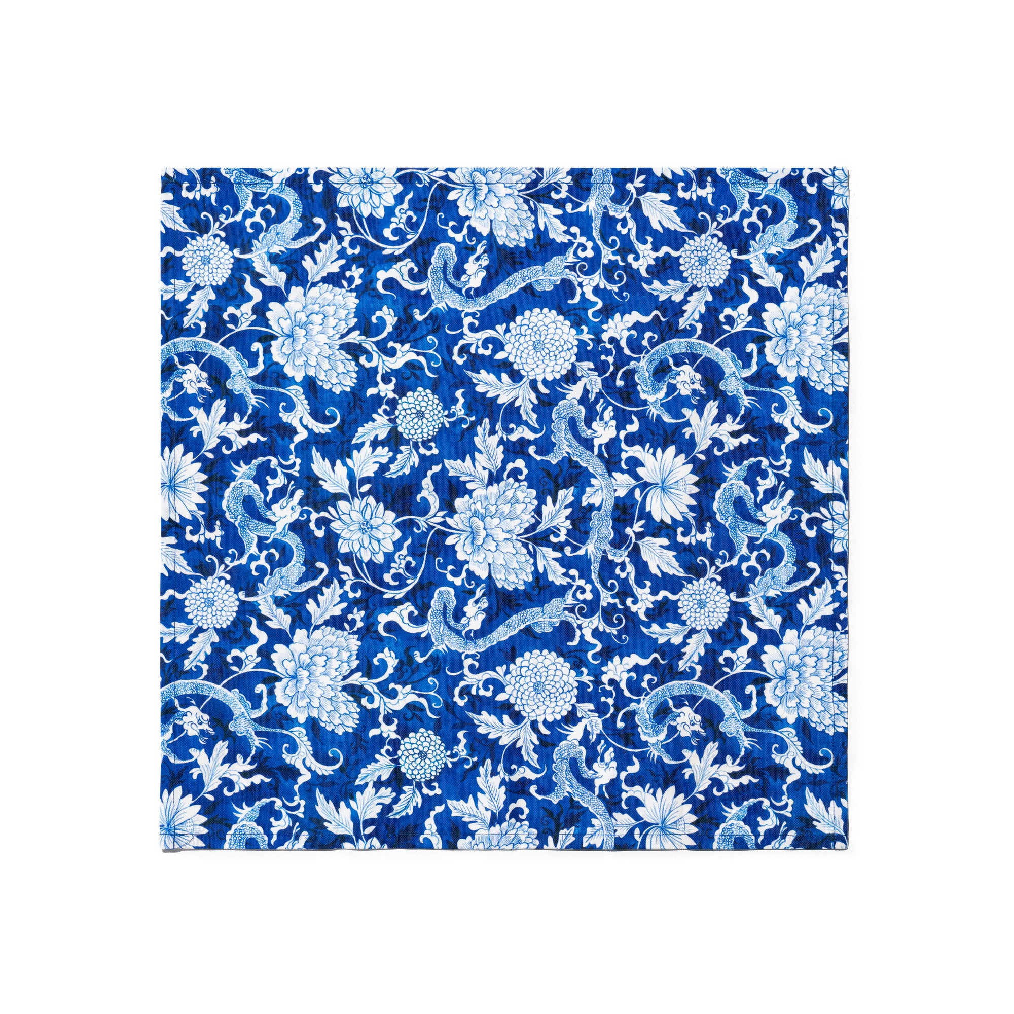 Singlapa blue napkin with a white floral and dragon pattern