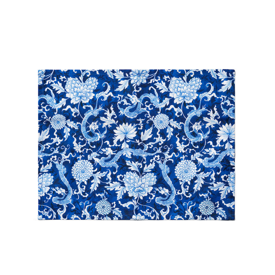 Singlapa blue placemat with white dragon and flowers.