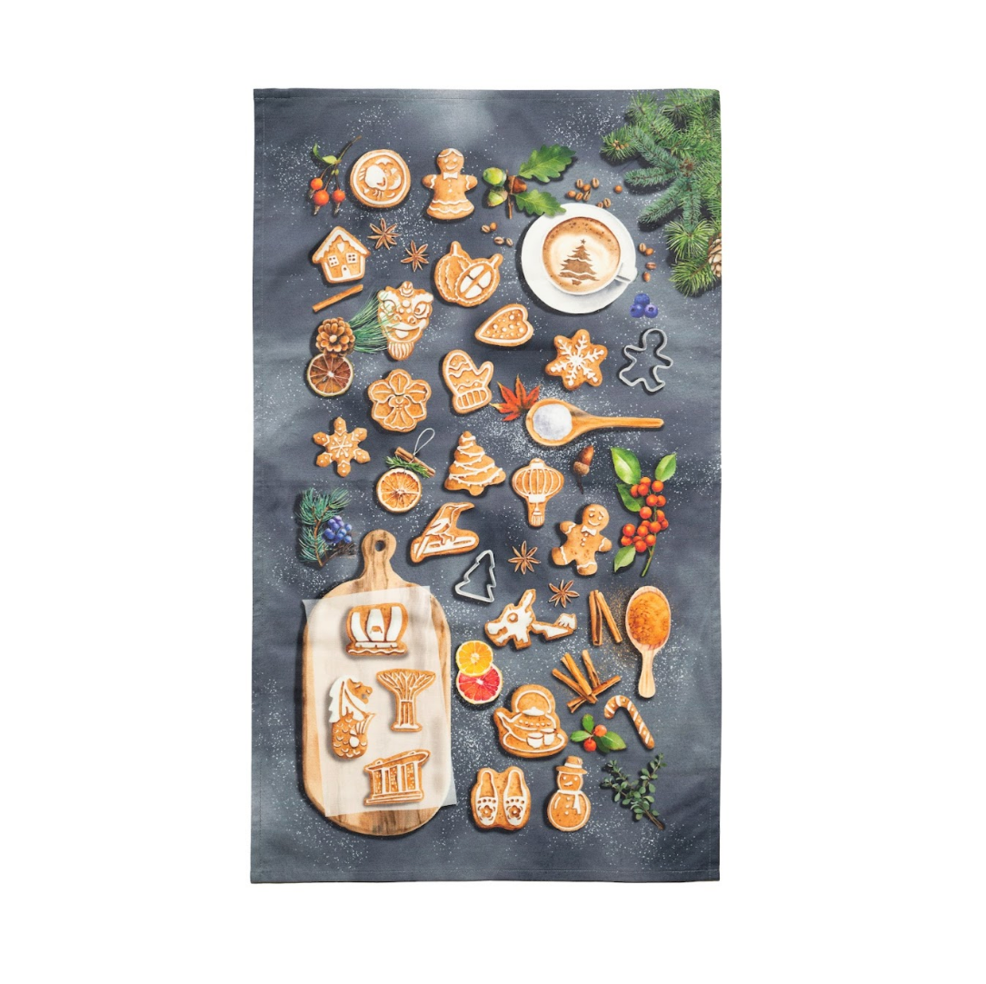 Singlapa kitchen towel with Singapore Christmas-themed cookies and utensils on a dark background