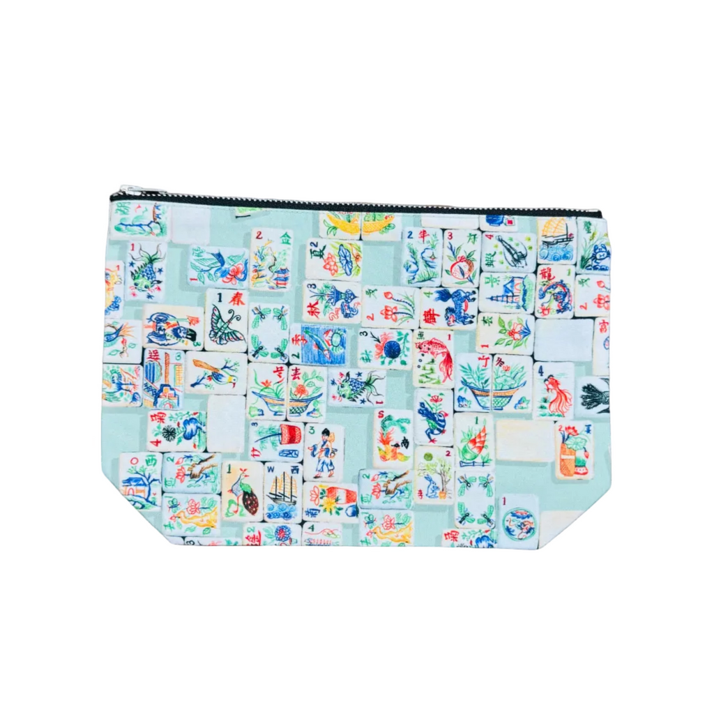 Colorful patterned pouch on a white surface