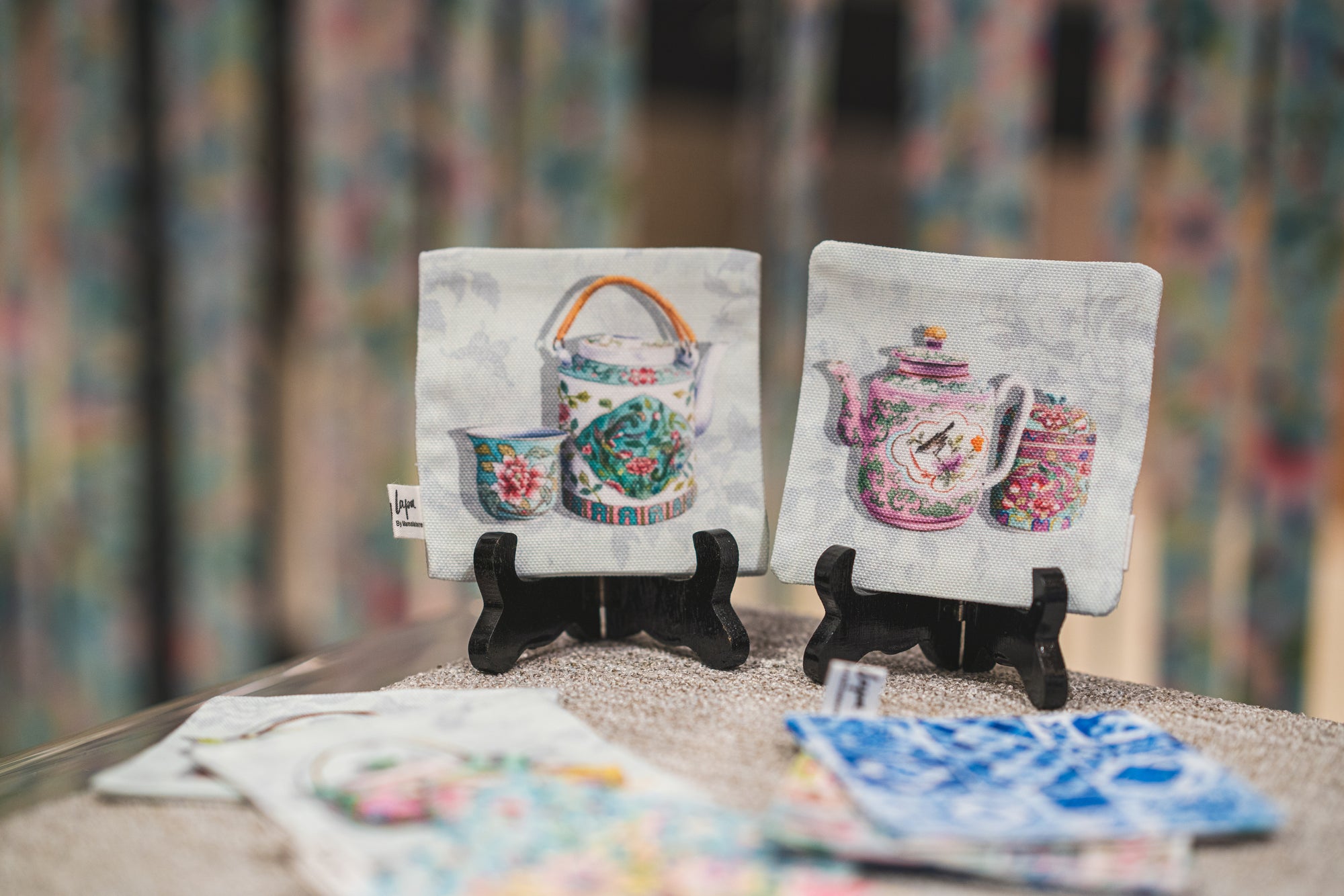 Display of Singlapa's Pink and Blue teapot coasters