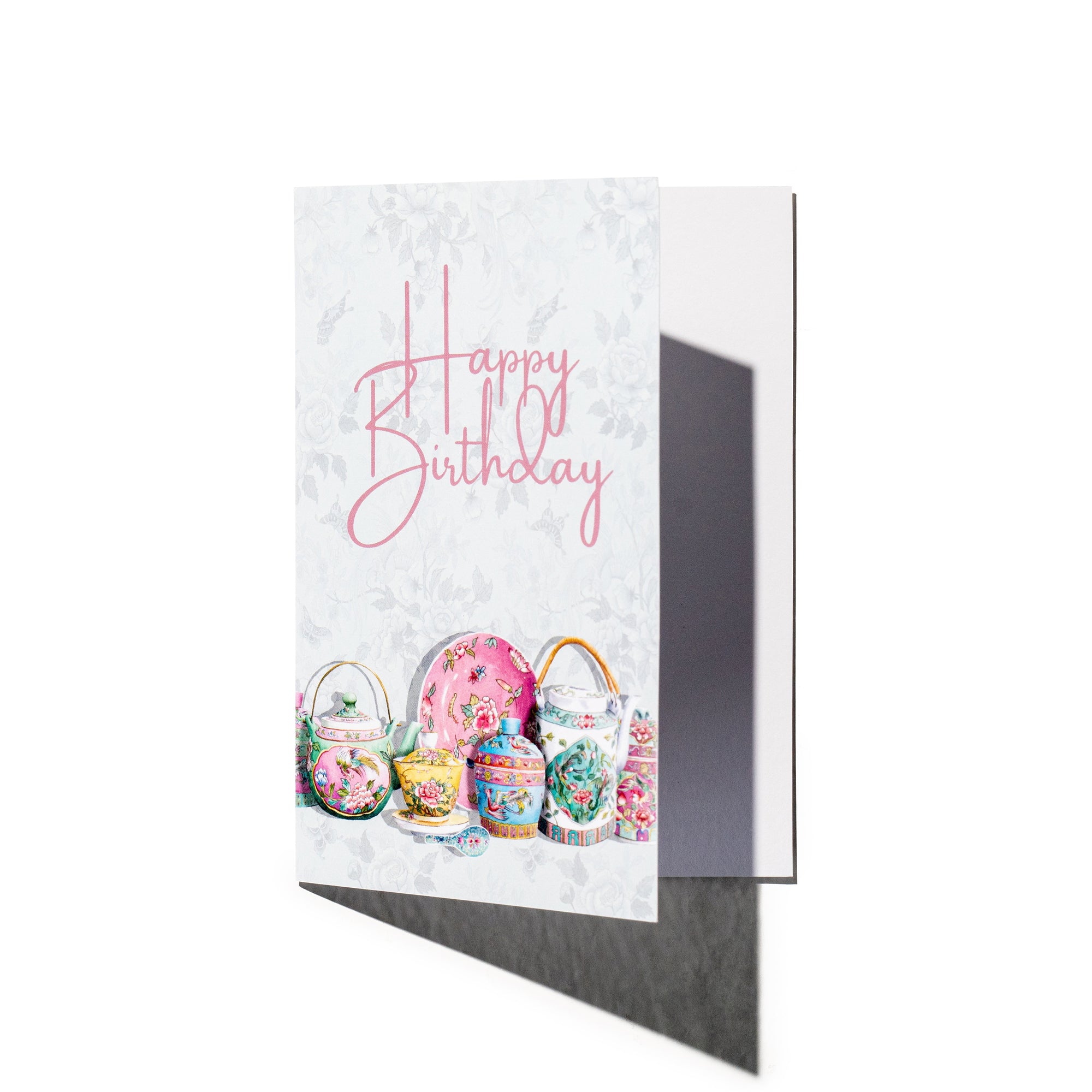 Singlapa greeting card with 'Happy Birthday' text and an illustration of hand-painted Peranakan teapots on a white background.
