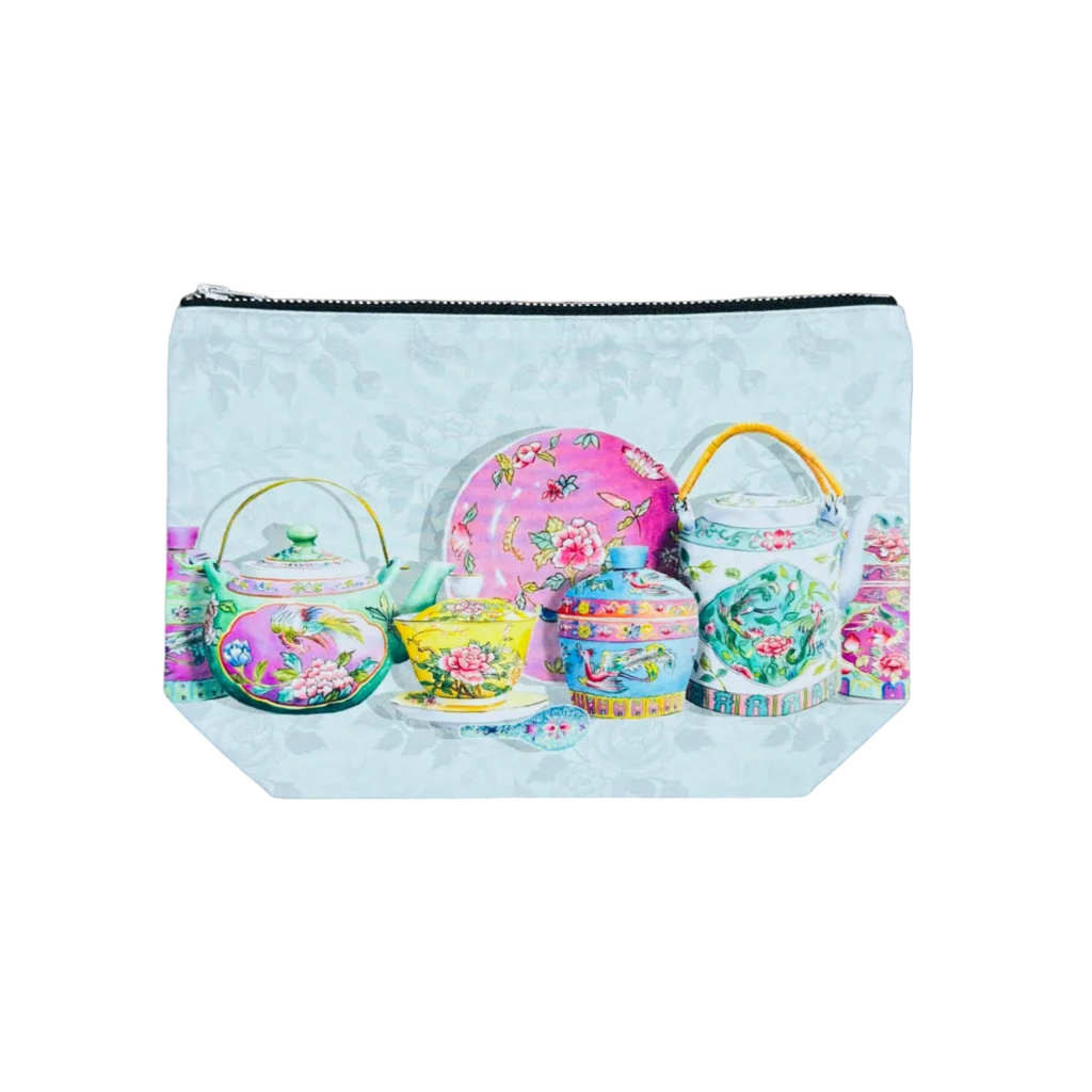 Pouch with floral teapot design on a white surface