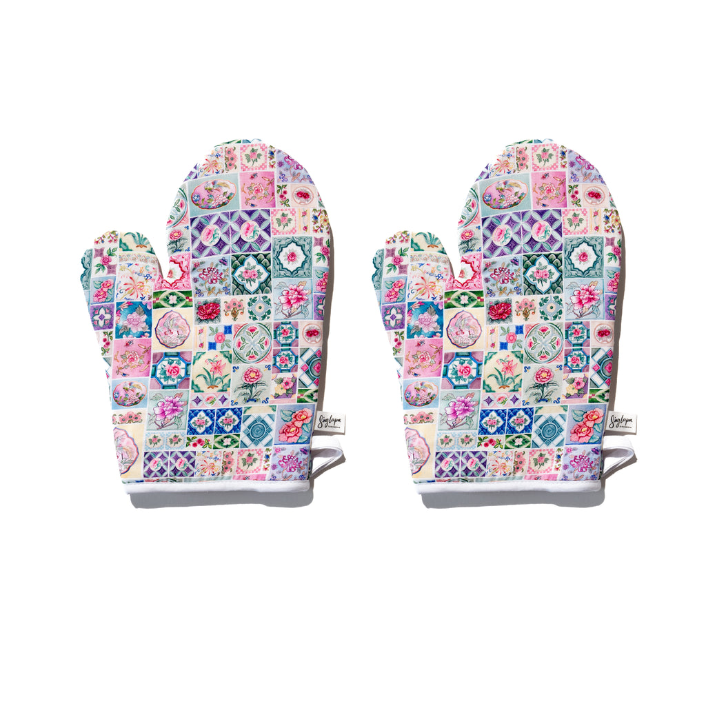 Singlapa oven mitts featuring a colorful floral tile design on a white background.