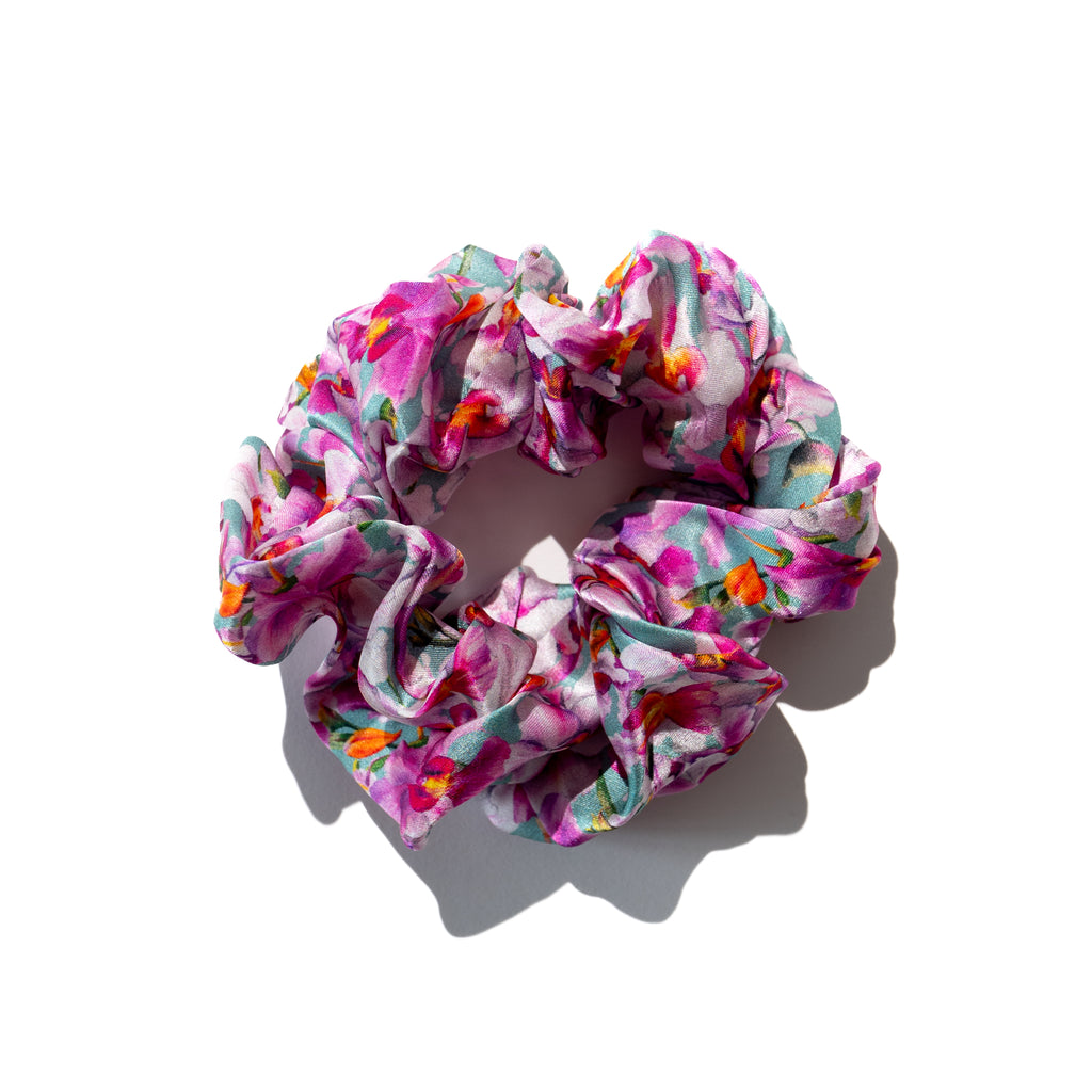Singlapa multicolored silk scrunchie with a vibrant orchid pattern with birds