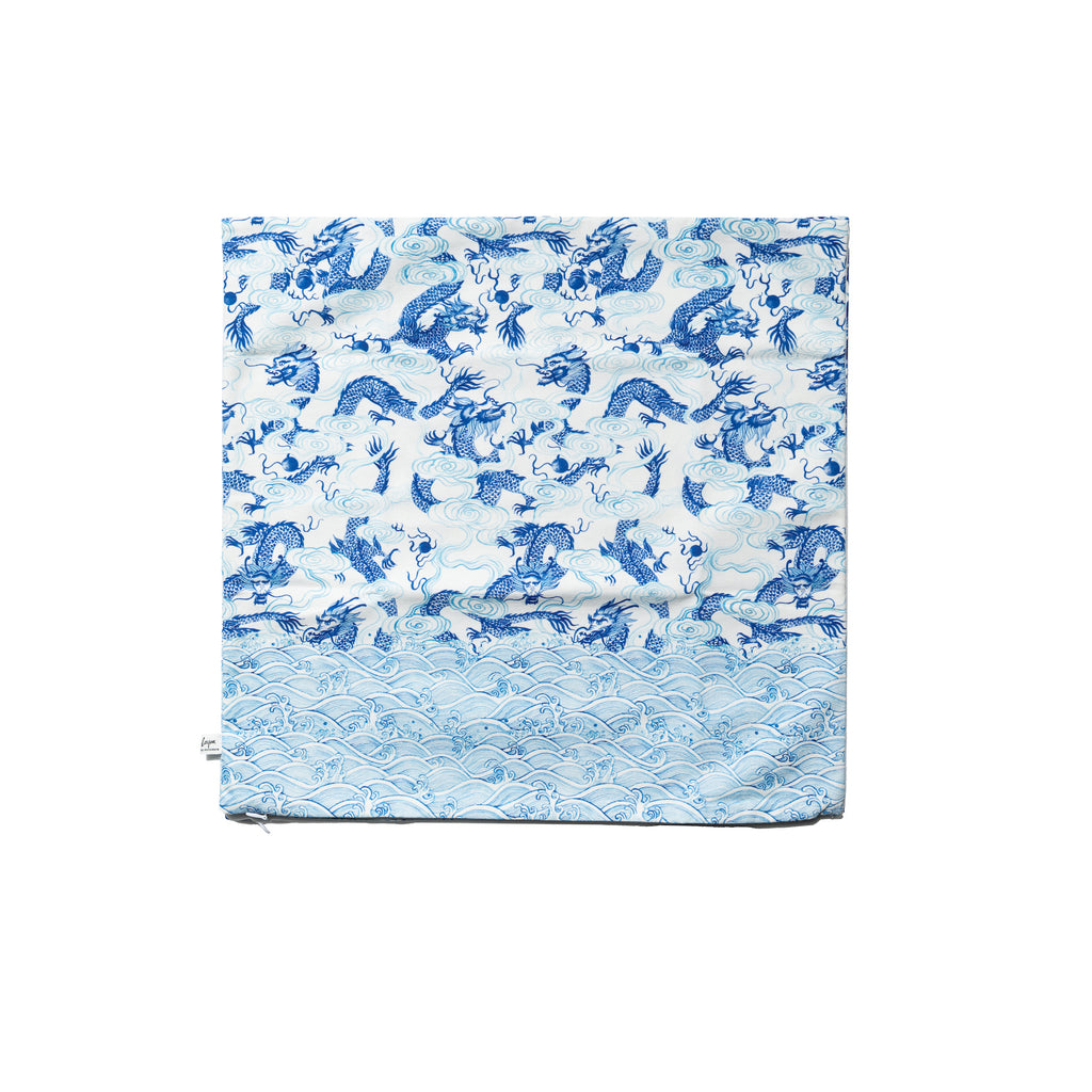 Singlapa cushion cover with a white and blue dragon pattern on a white background.
