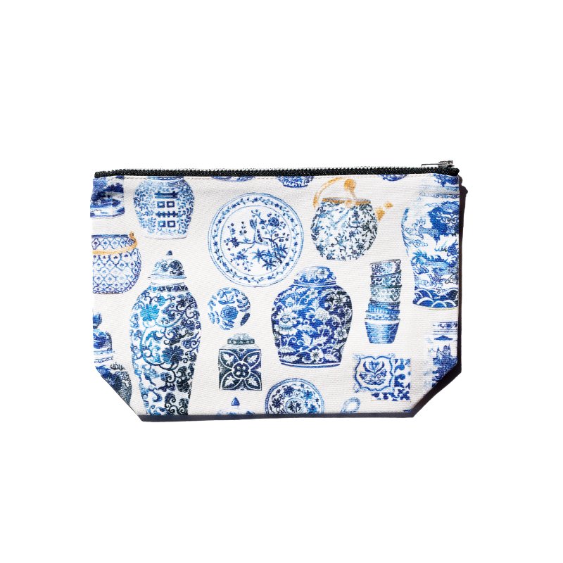 Singlapa blue and white porcelain pouch with various traditional motifs printed on it.