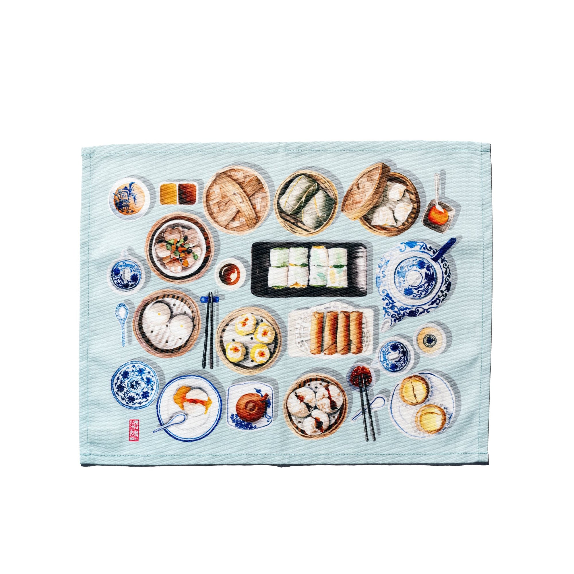 A blue placemat featuring a dim sum-inspired design with various food items and tableware illustrated on it.