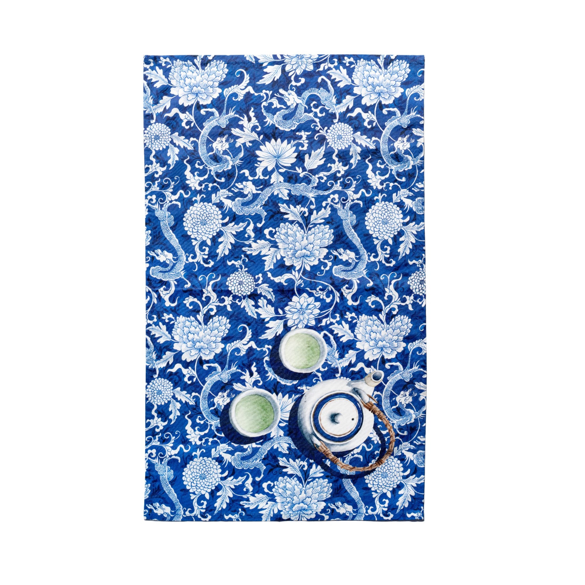 Singlapa tea towel with dragon designs and teapots on a blue background.