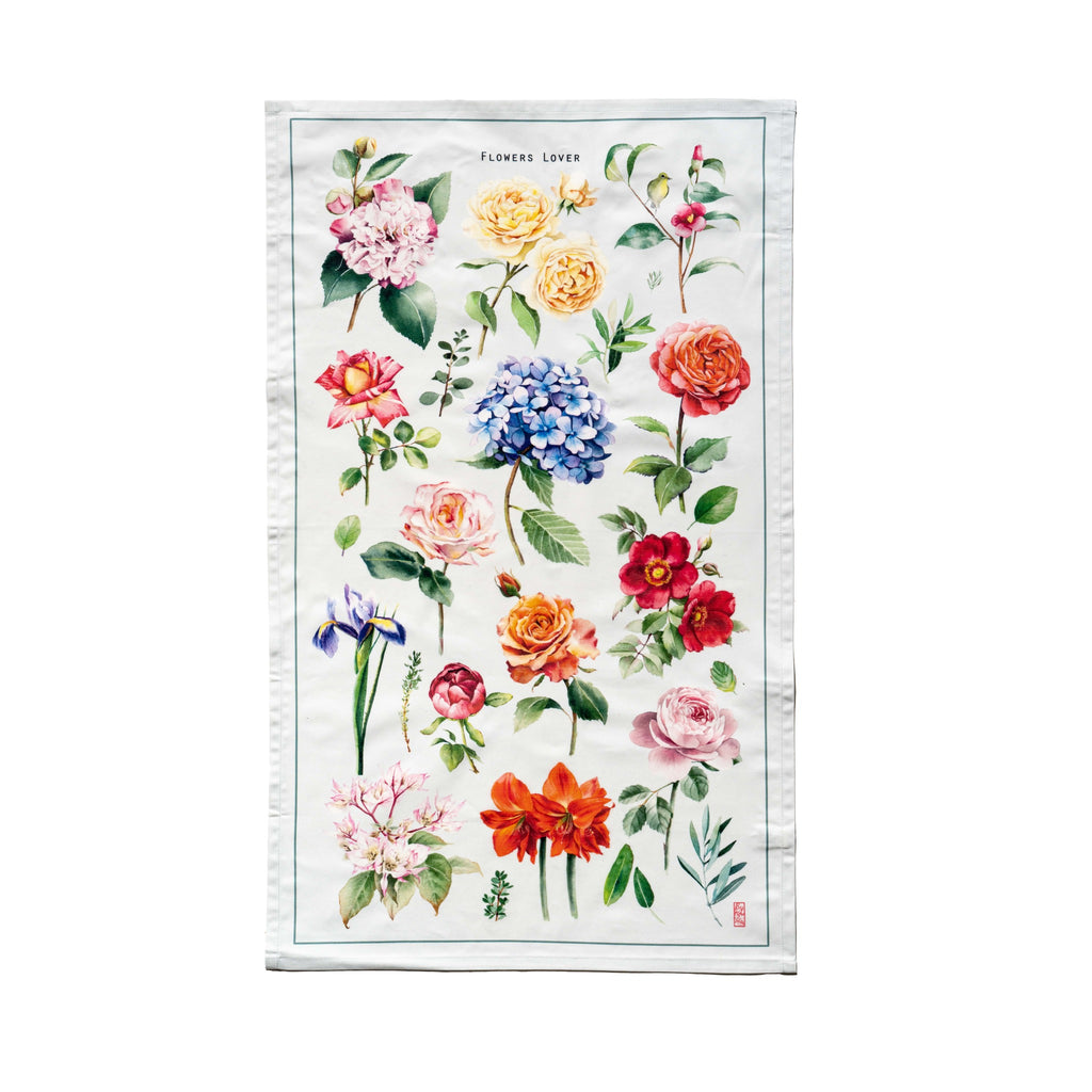 Singlapa kitchen towel featuring a vibrant floral pattern with various flowers such as roses and hydrangeas.