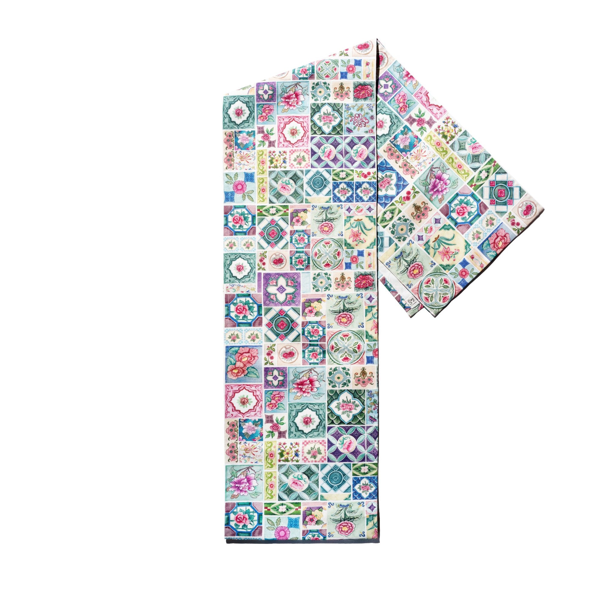Singlapa colorful Peranakan-inspired table runner with intricate geometric patterns.